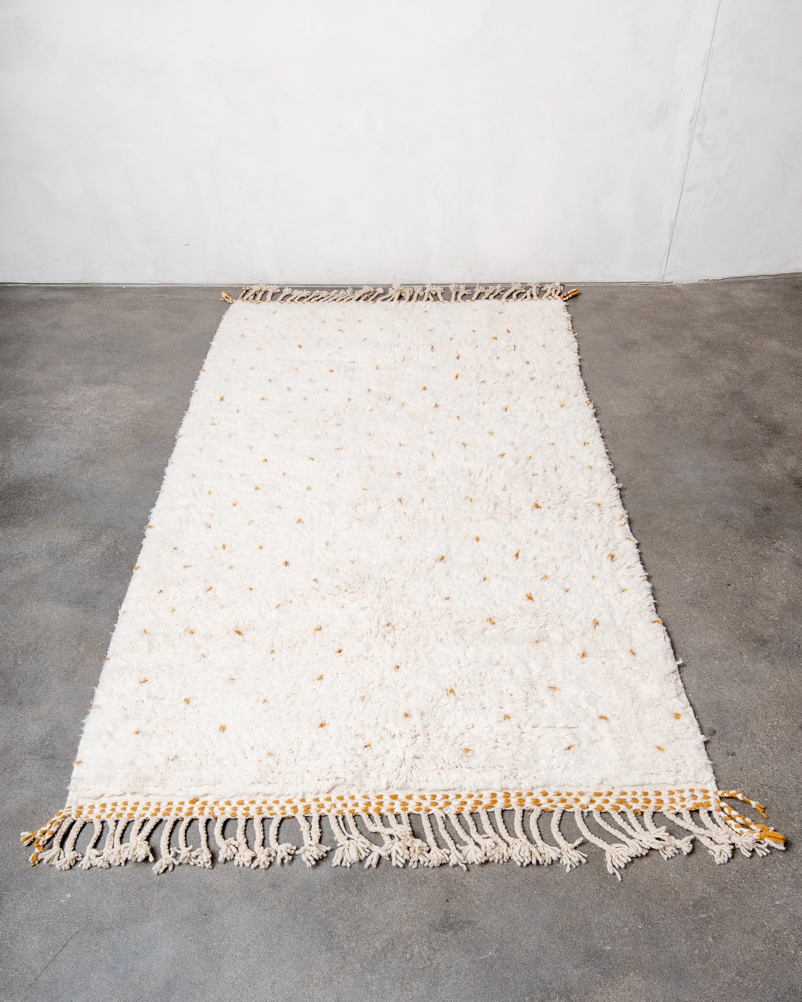 Modern, designer, handcrafted Berber rug from Morocco. Beniourain carpet with beautiful colours and patterns and fluffy wool texture.
